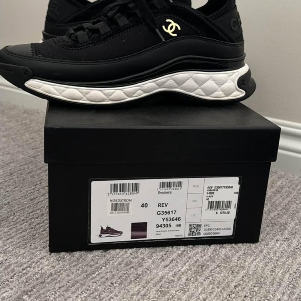 CHANEL Black and White Sneakers with Cushioned Midsole and Textured Upper